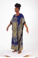  Dina Moses A poses dressed standing traditional long decora african dress whole body 0002.jpg